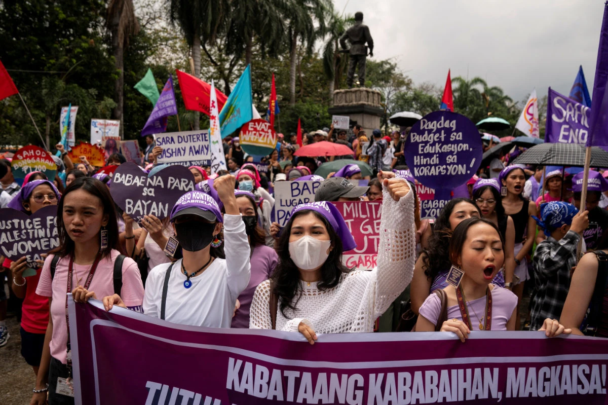 People take part in a protest to commemorate International Women's Day in Manila, Philippines, on March 8, 2025. (REUTERS)
