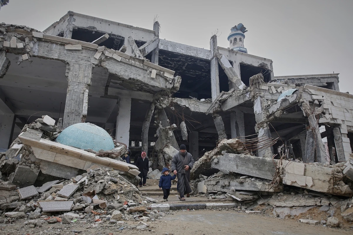 Palestinians leave after attending the first Friday prayers of Ramadan at Imam Shafi’i Mosque, damaged by Israeli army strikes, in Gaza City, Friday March 7, 2025.(AP)