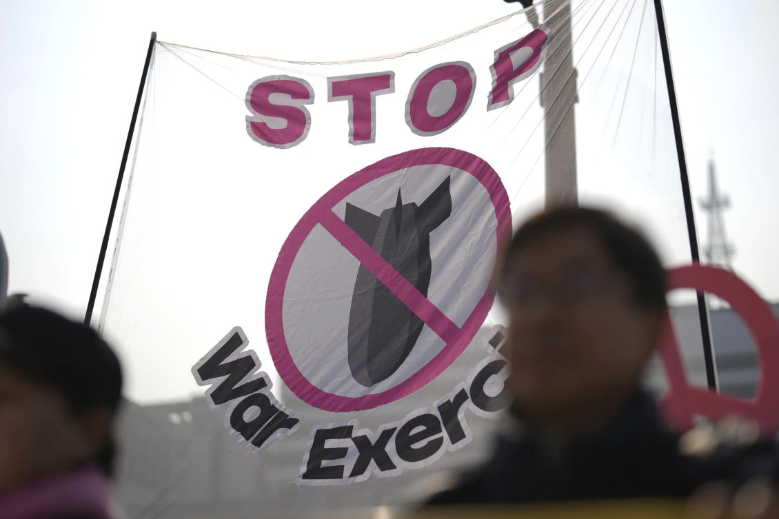 Protesters shout slogans in Seoul demanding to stop the Freedom Shield military exercise between the US and South Korea on Monday, March 10, 2025. (AP)