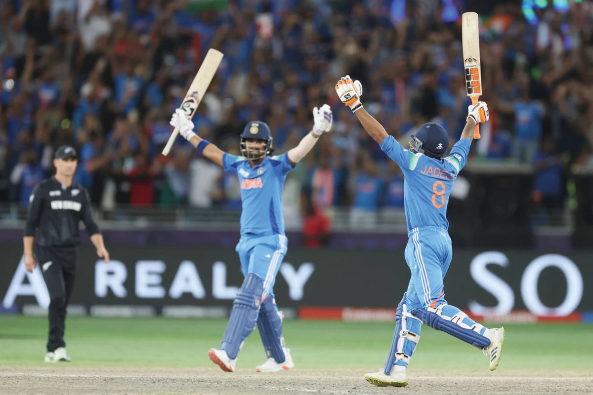 India’s Ravindra Jadeja, right, and batting partner KL Rahul celebrate their win in the ICC Champions Trophy final against New Zealand at Dubai International Cricket Stadium in Dubai Sunday. (AP)