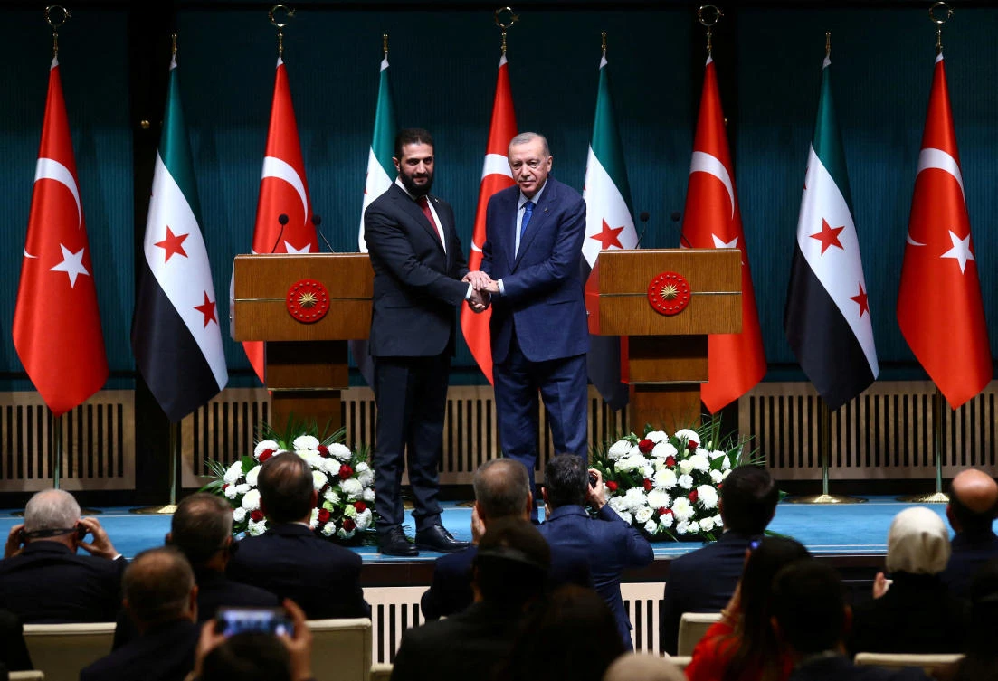 Syria’s newly appointed president for a transitional phase Ahmed Al-Sharaa and Turkiye’s President Tayyip Erdogan shake hands at the Presidential Palace in Ankara, Turkiye, Feb. 4, 2025. (Reuters)