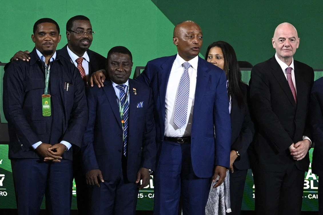 Former Cameroon star Samuel Eto’o (L), President of Fédération Internationale de Football Association (FIFA) Gianni Infantino (R) and President of the Confederation of African Football (CAF) Patrice Motsepe (2nd R) pose for a group picture during the CAF general assembly and the election of a new executive committee, in Cairo, on Mar. 12, 2025. (AFP)