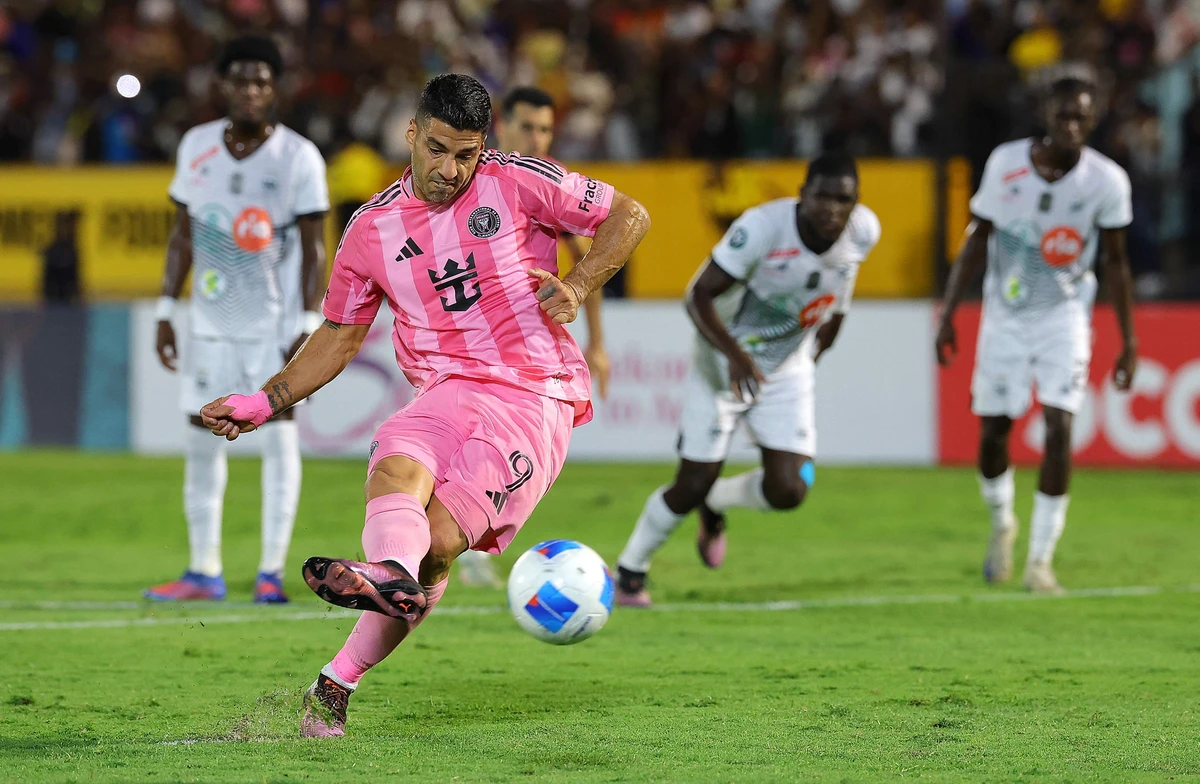 Luis Suarez of Inter Miami CF scores the team’s first goal via penalty during the 2025 CONCACAF Champions Cup Round of 16 second leg match between Cavalier SC and Inter Miami CF at The Jamaican National Stadium on Thursday in Kingston, Jamaica. (Getty Images via AFP)