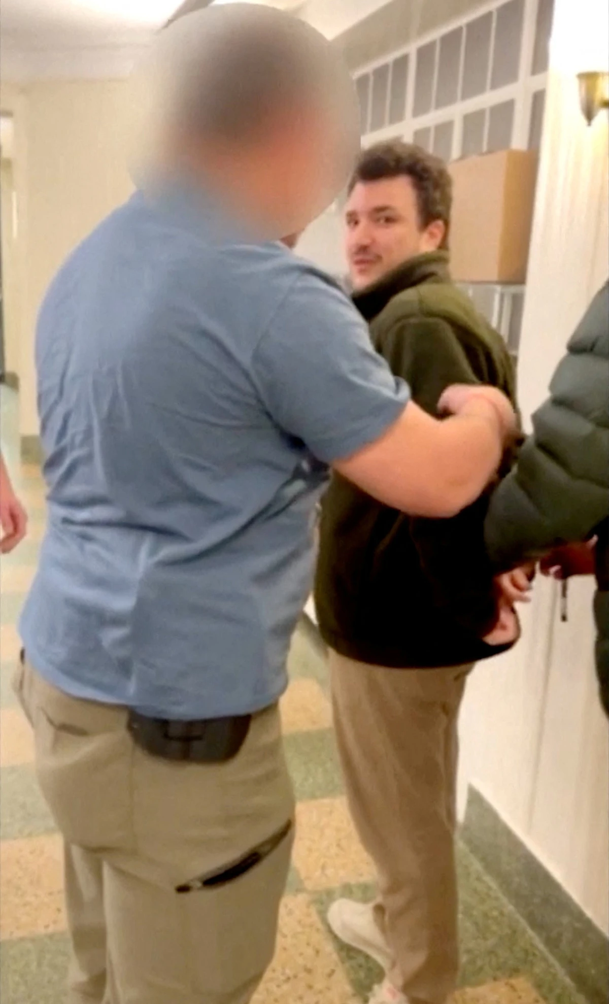 Mahmoud Khalil, a Columbia University student who played a prominent role in pro-Palestinian protests at the university, is detained by U.S. federal immigration agents in New York, U.S., March 8, 2025, in this still image obtained from a video. (REUTERS)