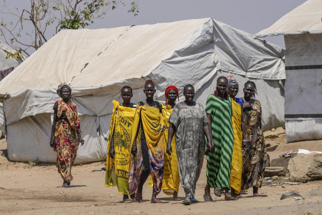 Women walk in the Juba displacement camp, South Sudan, Feb. 12, 2025. (AP)