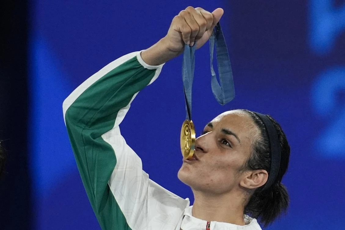 Gold medalist Algeria’s Imane Khelif kisses her medal for the women’s 66 kg final boxing match at the 2024 Summer Olympics, Aug. 9, 2024, in Paris. (AP/File)