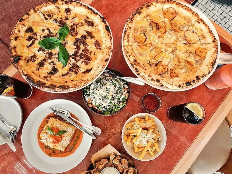 Located in a buzzing plaza on Al-Urubah road, the restaurant is a lively space with a simple yet elegant ambience accented with jade tiles and greenery. (Supplied)
