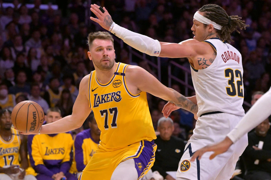 Los Angeles Lakers guard Luka Doncic scored nine points in less than three minutes and 20 points in about eight minutes against the Denver Nuggets. (Jayne Kamin-Oncea-Imagn Images)