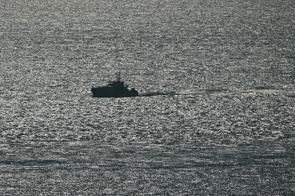 Above, a UK Border Force vessel, carrying migrants picked up at sea attempting to cross the English Channel from France, makes its way back to the Marina in Dover, southeast England, on March 6, 2025. (AFP)