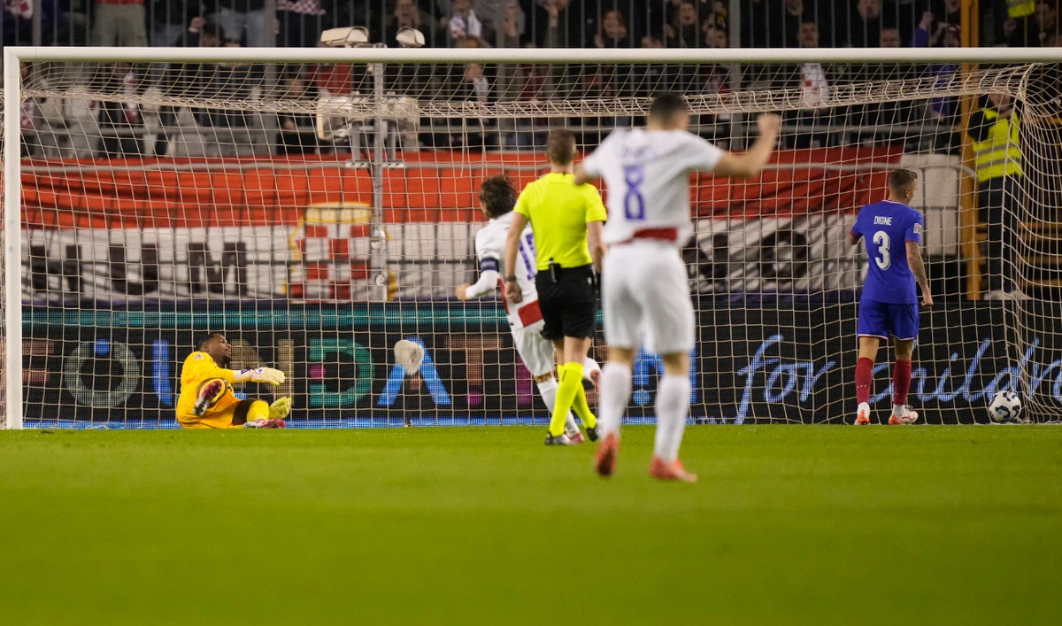 France's goalkeeper Mike Maignan fails to stop a header by Croatia's Ante Budimir during the UEFA Nations League quarterfinal soccer match between Croatia and France, at the Poljud stadium in Split, Croatia, Thursday, March 20, 2025. (AP)