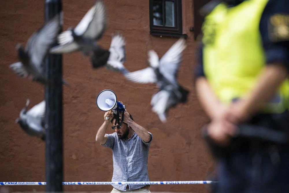 Salwan Momika, above, a 38-year-old Iraqi Christian whose actions sparked outrage in several Muslim countries, was shot on January 29 in an apartment in Sodertalje, south of Stockholm. (AFP file photo)