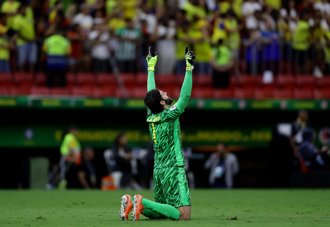 Brazil’s Alisson Becker reacts during their World Cup — South American Qualifiers — match against Colombia — Estadio Mane Garrincha, Brasilia, Mar. 20, 2025. (Reuters)