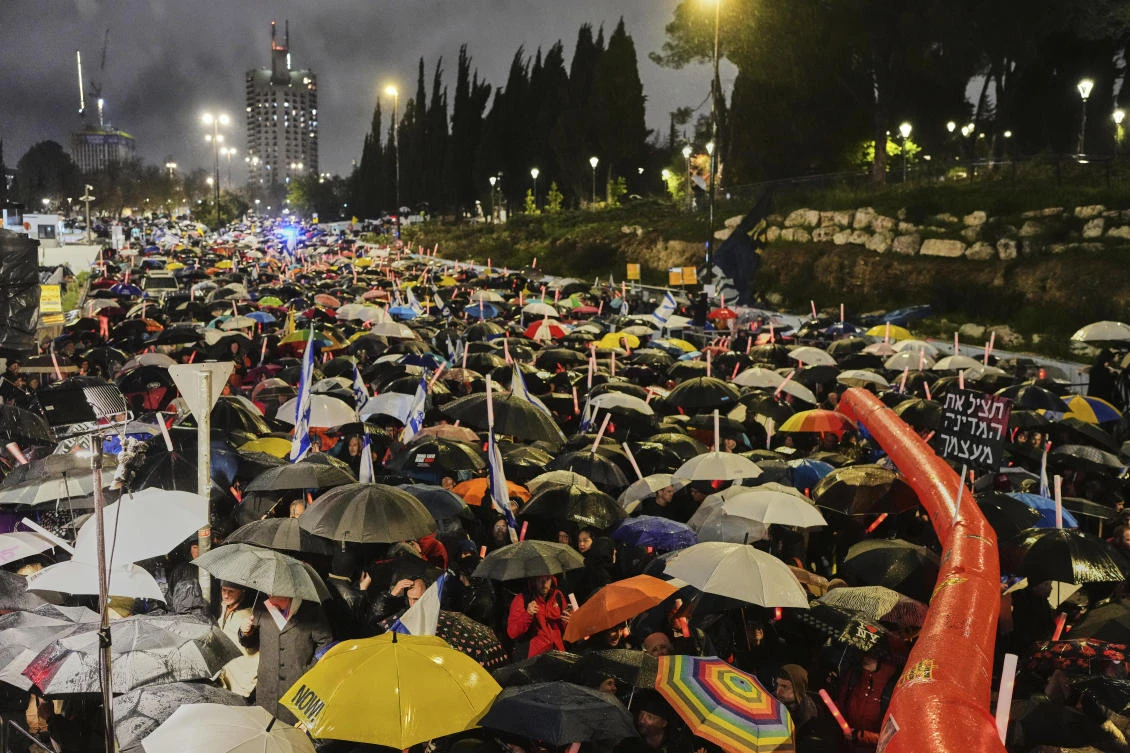 Israelis attend a rally against PM Benjamin Netanyahu’s plan to dismiss the head of the Shin Bet internal security service, and calling for the release of hostages held by Hamas in Gaza, outside the Knesset, Israel’s parliament in Jerusalem on Mar. 20, 2025. (AP)