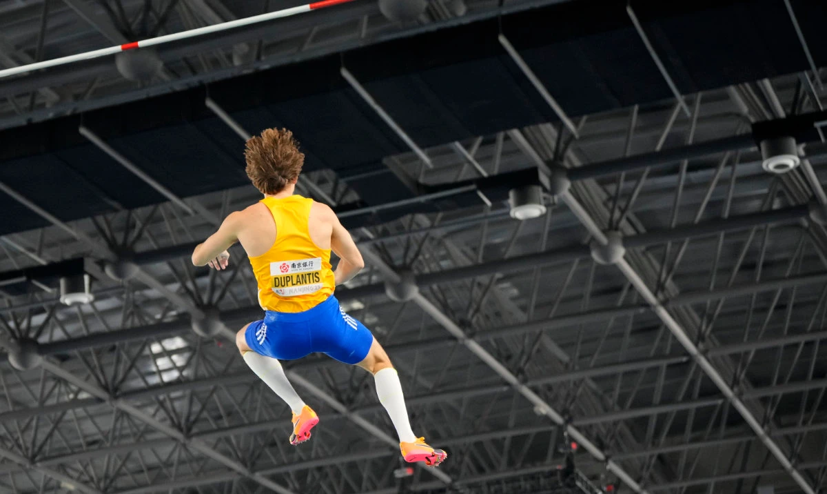 Armand Duplantis, of Sweden, clears the bar during an attempt on his way to a gold medal in the men's pole vault final at the World Athletics Indoor Championships in Nanjing, China, Saturday. (AP)