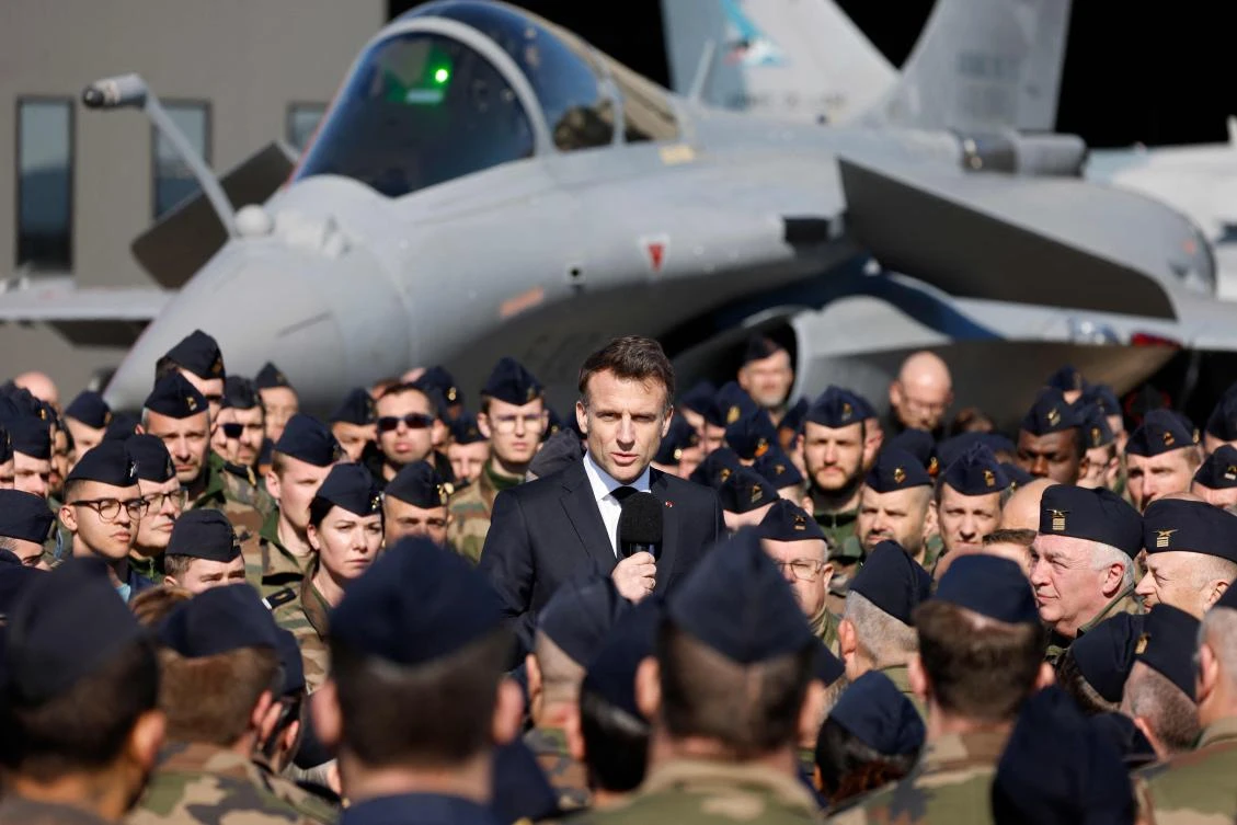 France's President Emmanuel Macron delivers a speech in front of a Dassault Rafale fighter aircraft during his visit to Luxeuil-Saint-Sauveur Airbase in Saint-Sauveur, Mar. 18, 2025. (AFP)