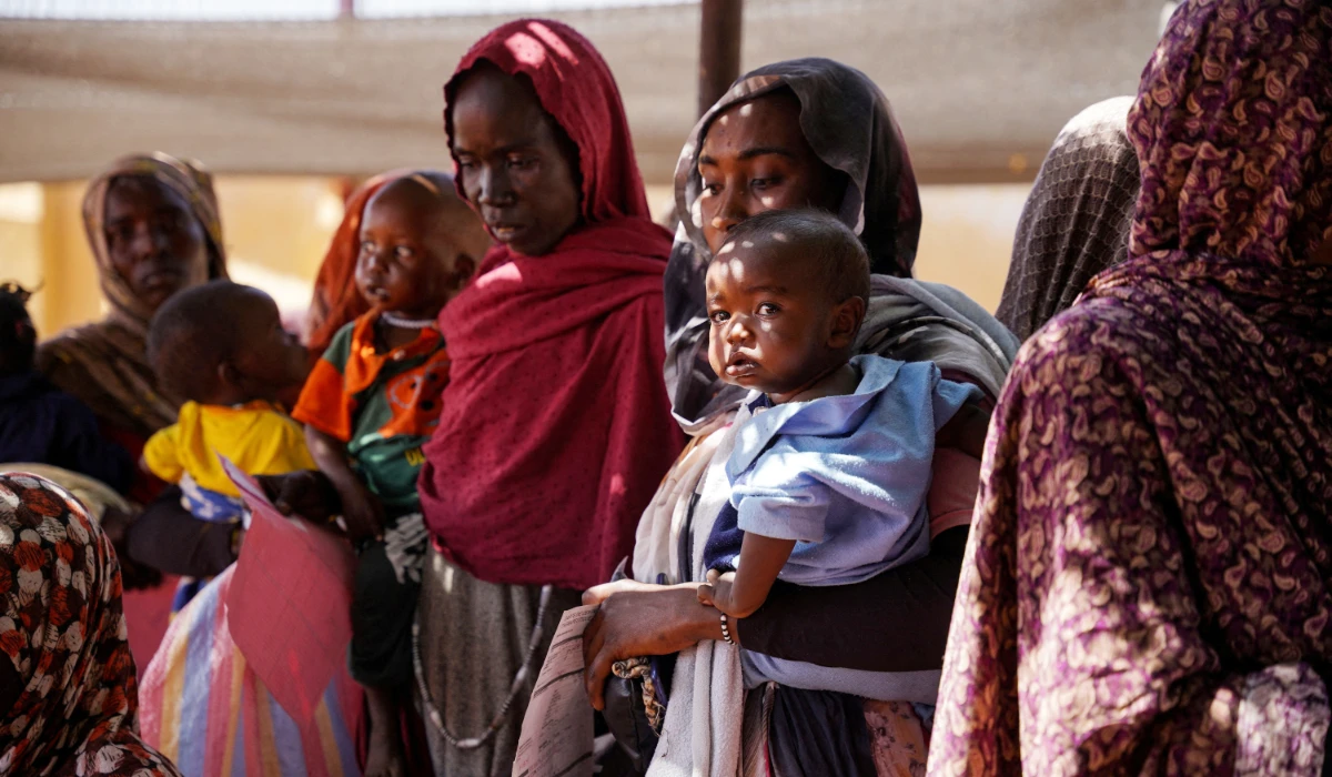 A handout photograph, shot in January 2024, shows women and babies at the Zamzam displacement camp, close to al-Fashir in North Darfur, Sudan. (REUTERS)