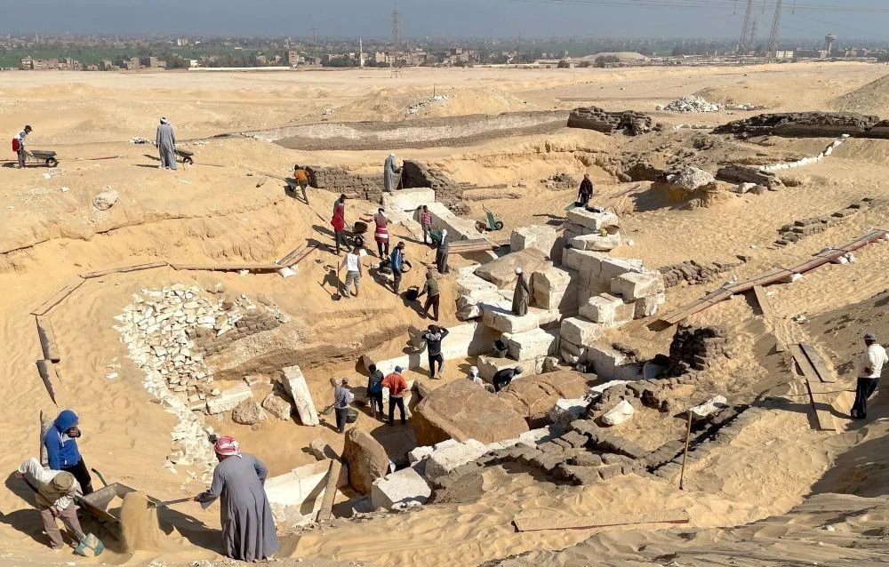 Archaeologists and researchers at the site of the newly discovered tomb at Abydos, one of the oldest cities of ancient Egypt, about 300 miles south of Cairo. (Josef W. Wegner for the Penn Museum)
