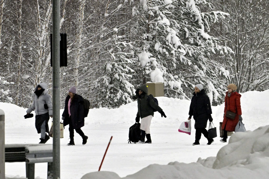 Migrants arrive at the Vaalimaa border check point between Finland and Russia in Virolahti, Finland Dec. 15, 2023. (Reuters/File)