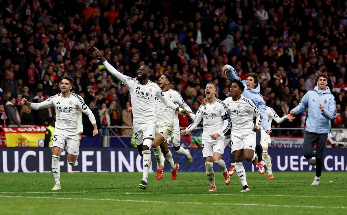 Real Madrid’s Antonio Rudiger celebrates with teammates after their Champions League — Round of 16 — Second Leg — match against Atletico Madrid — Metropolitano, Madrid, Mar. 12, 2025. (Reuters/File)