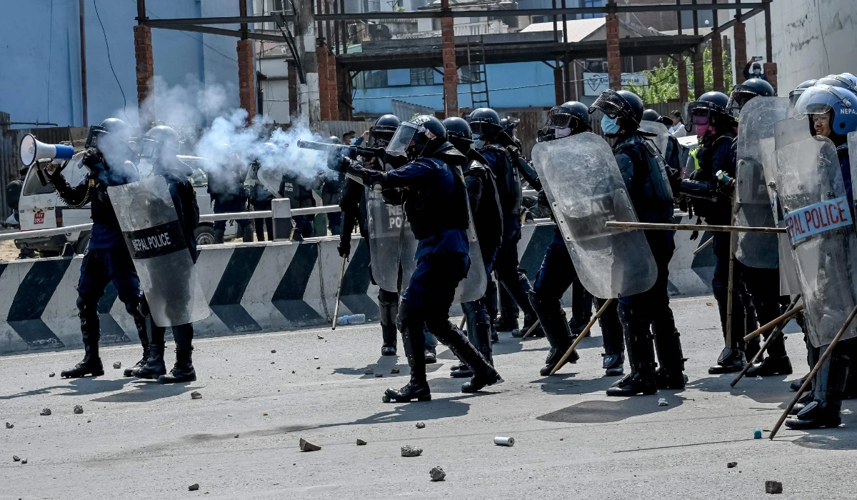 Nepal police fire tear gas to disperse pro-monarchy demonstrators demanding a Hindu state, in Kathmandu on March 28, 2025. (AFP)