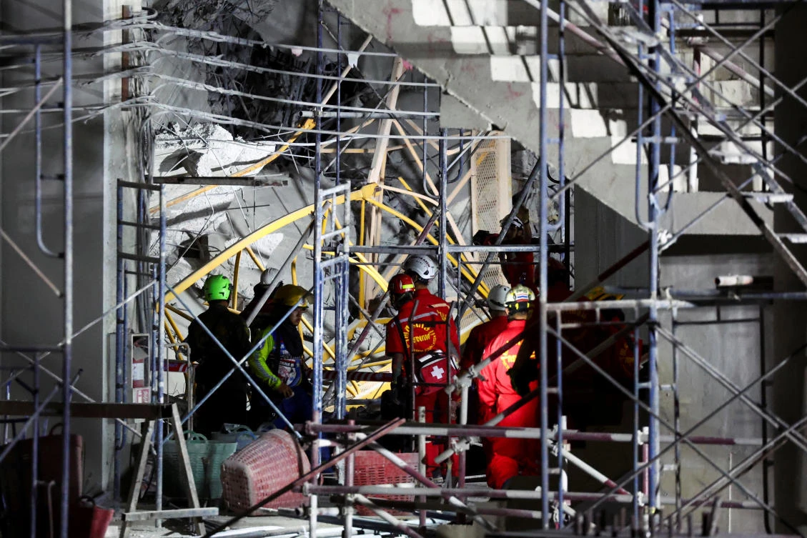 Rescue personnel search for casualties at the site of a building that collapsed after a strong earthquake struck central Myanmar on Friday, earthquake monitoring services said, which affected Bangkok as well with people pouring out of buildings in the Thai capital in panic after the tremors, in Bangkok, Thailand. (REUTERS)