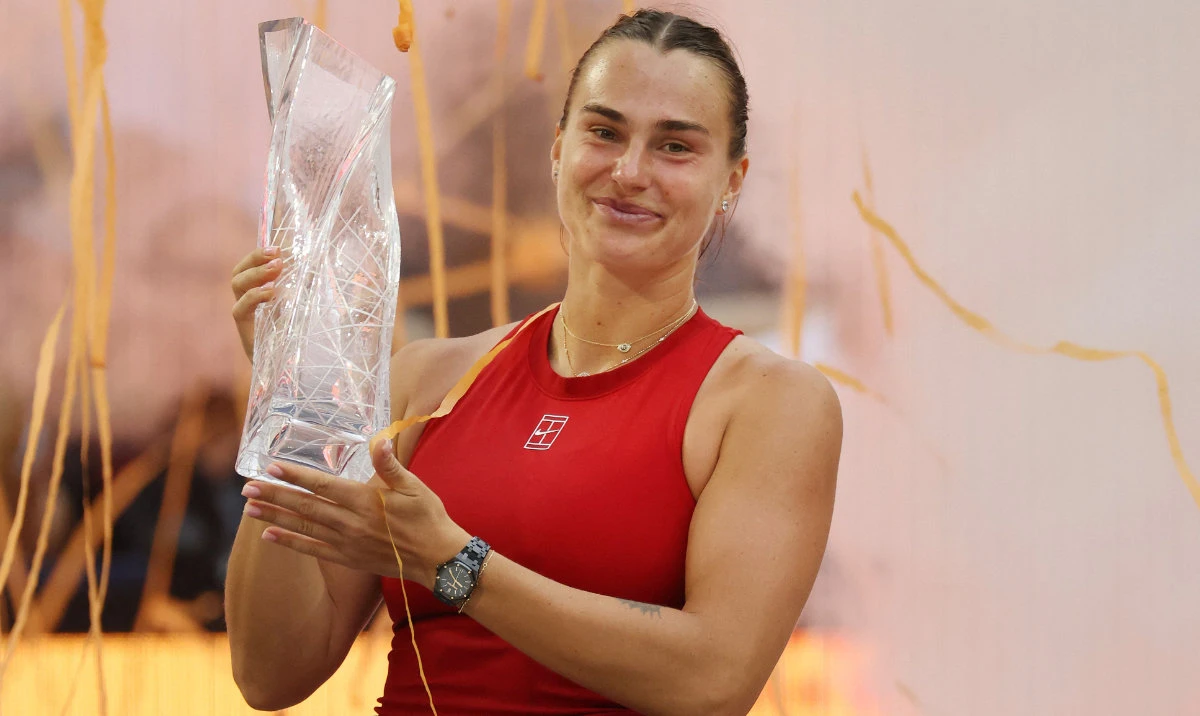 Aryna Sabalenka poses with the Butch Buchholz Trophy following her victory against Jessica Pegula of the United States in the women's final on Day 12 of the Miami Open Presented by Itau 2025 at Hard Rock Stadium on March 29, 2025 in Miami Gardens, Florida. (AFP)
