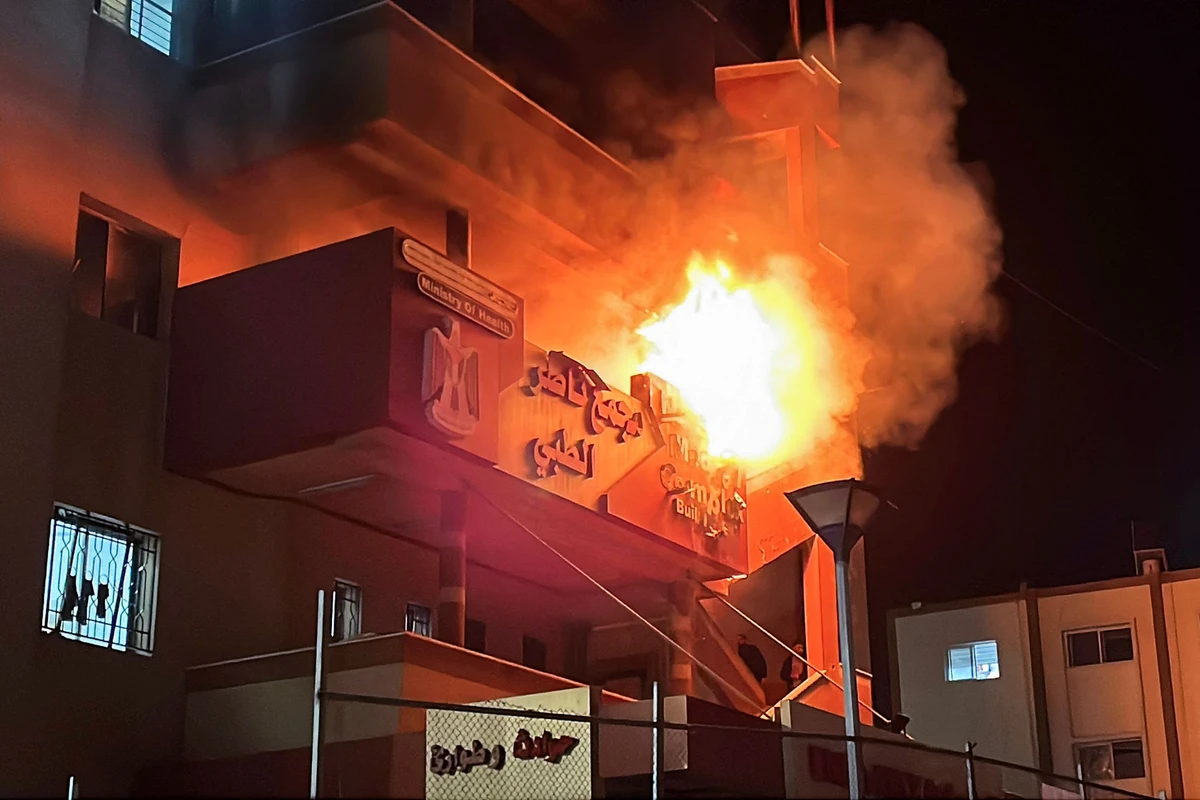 A fire burns at the emergency department of the Nasser hospital after it was hit in an Israeli airstrike. (AFP)