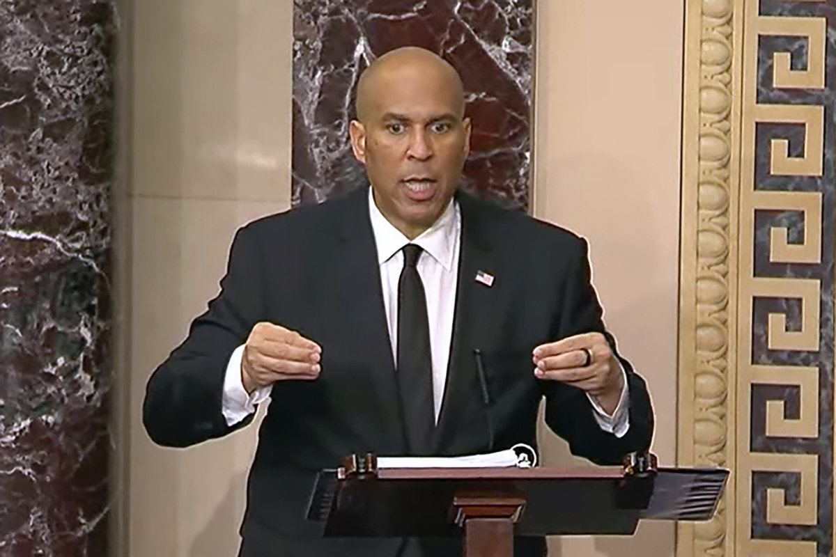 In this image provided by US Senate Television, Sen. Cory Booker speaks on the Senate floor, on April 1, 2025. (Senate Television via AP)