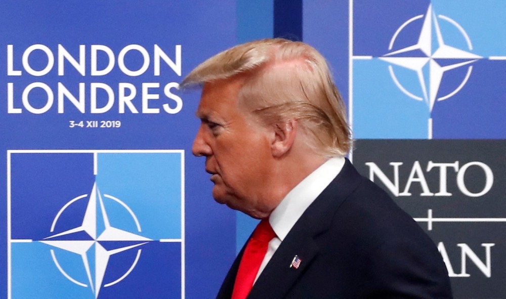 US President Donald Trump arrives for the NATO summit at the Grove hotel in Watford, northeast of London on December 4, 2019. (AFP/File)