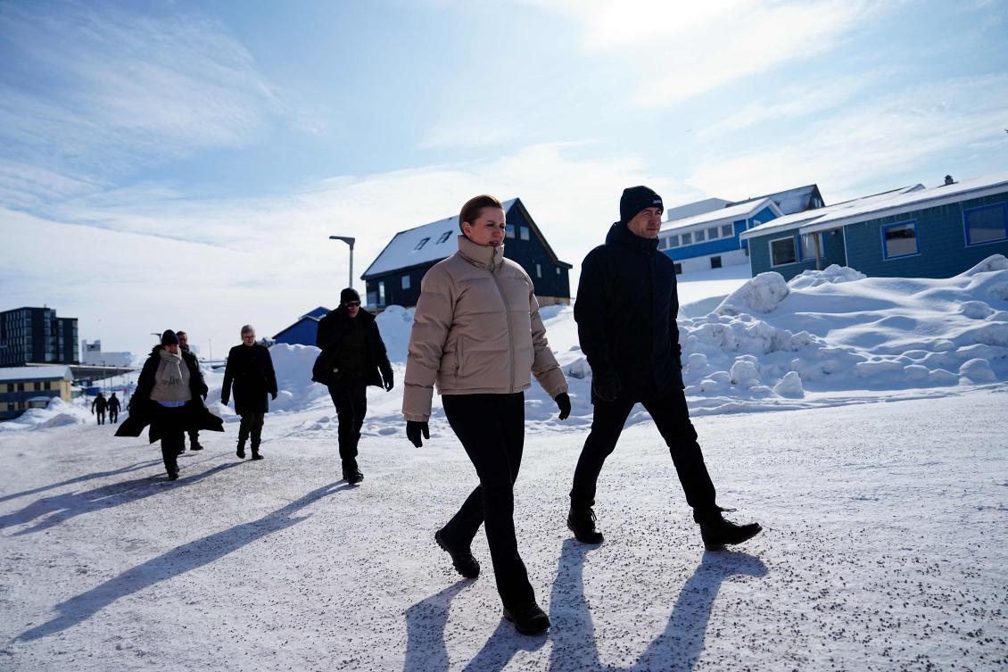 Denmark’s Prime Minister Mette Frederiksen, second right, walks next to Greenland’s acting Head of Government, Mute Bourup Egede in Nuuk, Greenlkand on April 2, 2025. (AFP)