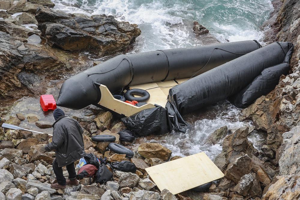 Above, a destroyed rubber boat in Thermi on the Greek island of Lesbos on Feb. 7, 2023. Greece is one of the main entry points into the European Union for people fleeing conflict and poverty. (AFP file photo)