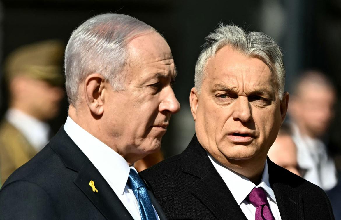 Hungary's Prime Minister Viktor Orban (R) and Israeli Prime Minister Benjamin Netanyahu review a military honor guard on April 3, 2025 in Budapest, Hungary. (AFP)