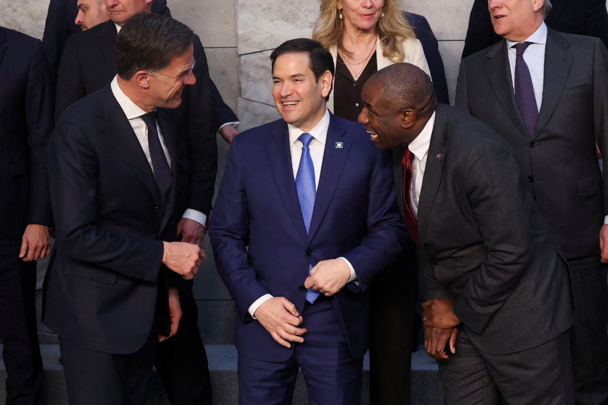 NATO Secretary General Mark Rutte, British Foreign Secretary David Lammy and US Secretary of State Marco Rubio talk as they pose for a family photo with NATO foreign ministers at the alliance's headquarters in Brussels, Belgium, on April 3, 2025. (REUTERS)