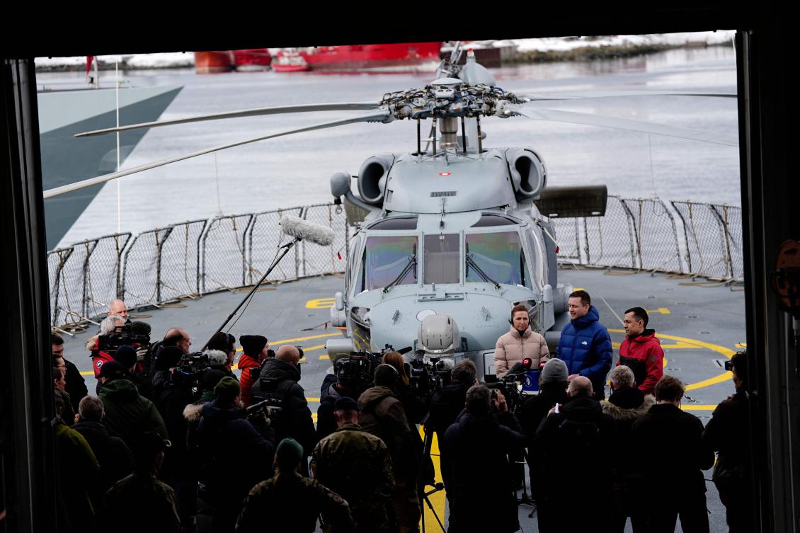 Denmark’s Prime Minister Mette Frederiksen, center, Greenland’s acting head of government Mute Bourup Egede, right, and newly elected head of government Jens-Frederik Nielsen meet the press aboard the Danish Navy inspection ship Vaedderen in Nuuk, Greenland, on April 3, 2025. (AFP)