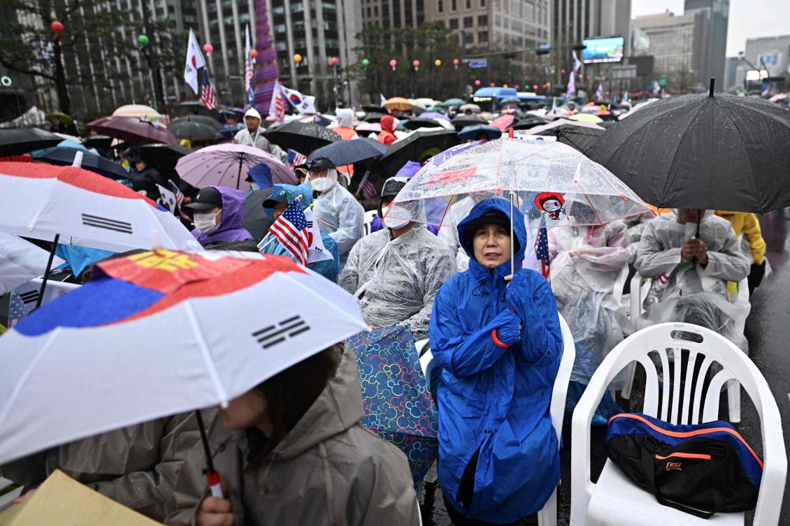 Supporters of impeached South Korean president Yoon Suk Yeol attend a rally on a street in Seoul on April 5, 2025. (AFP)