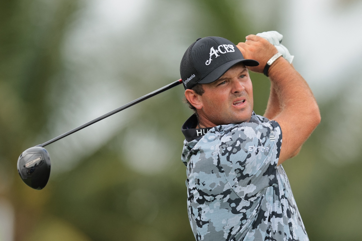 Patrick Reed plays his shot from the 18th tee during the first round of the LIV Golf Miami golf tournament at Trump National Doral. (Imagn Images)