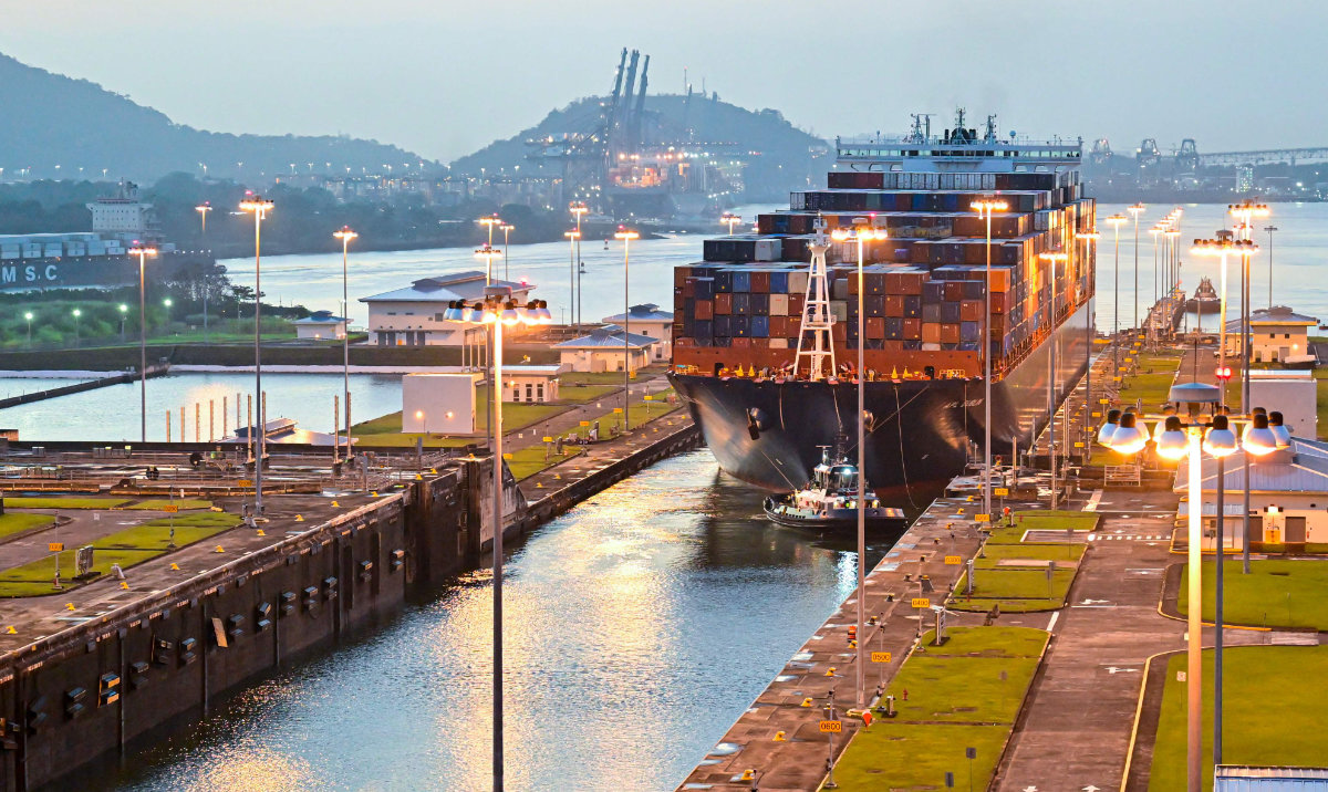 A cargo ship transits through Panama Canal Cocoli locks in Panama City. The Panama Canal announced on April 4, 2025, that it will open a tender to build an 80 km pipeline to transport fuel between the Caribbean and the Pacific in an attempt to diversify its business. (AFP/File)