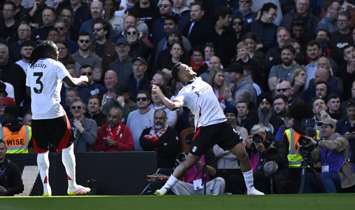 Fulham’s Rodrigo Muniz celebrates scoring their third goal with Fulham’s Calvin Bassey in a 3-2 win over Liverpool. (Reuters)