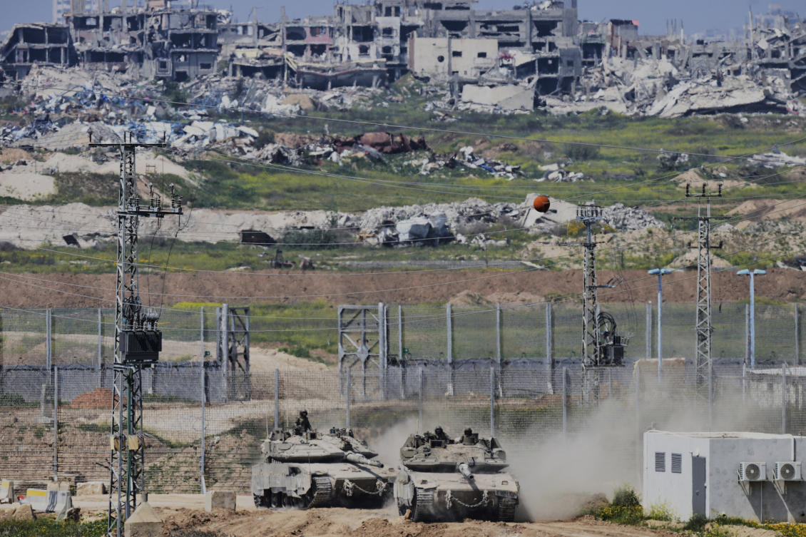 Above, Israeli tanks maneuver along the border with north of the Gaza Strip on March 18, 2025. Israel has depicted its tightening grip on Gaza as a temporary necessity to pressure Hamas into releasing the remaining hostages taken during the Oct. 7, 2023 attack. (AP)