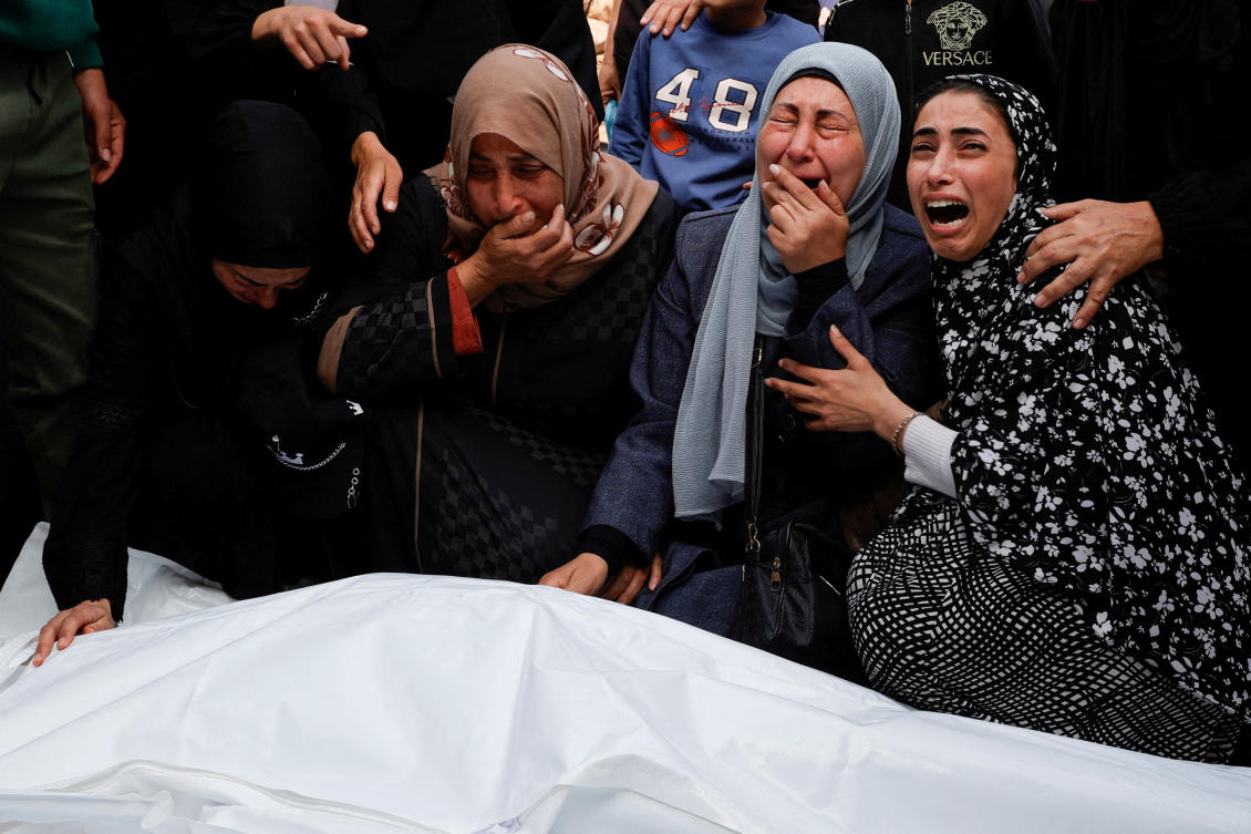 Mourners react next to the bodies of Palestinians killed in Israeli strikes, at Nasser hospital, in Khan Younis in the southern Gaza Strip on April 7, 2025. (Reuters)