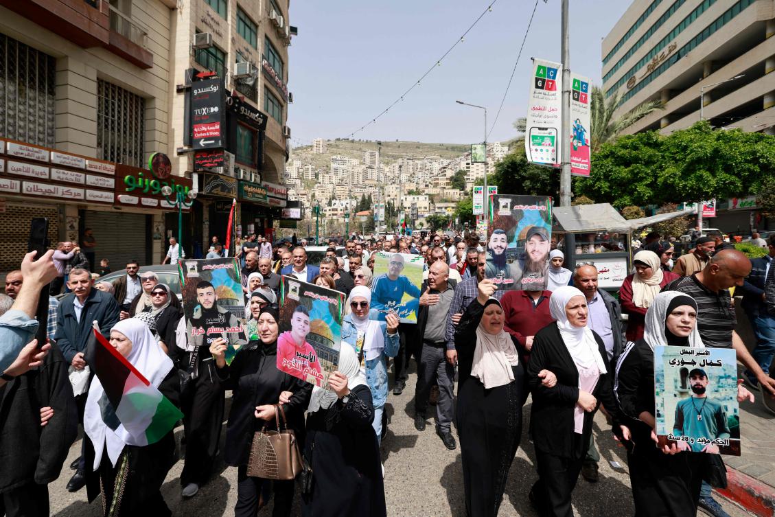 Palestinians chants slogans as they march, during a general strike demanding an end to the Gaza war, in Nablus in the Israeli occupied West Bank on April 7, 2025. (AFP)