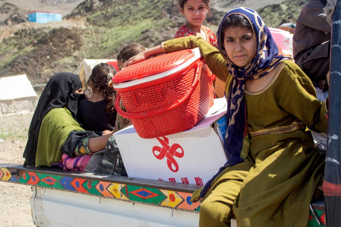 Afghan refugees deported from Pakistan arrive with their belongings at a makeshift camp near the Afghanistan-Pakistan border in Torkham, Nangarhar province, Apr. 7, 2025. (AFP)