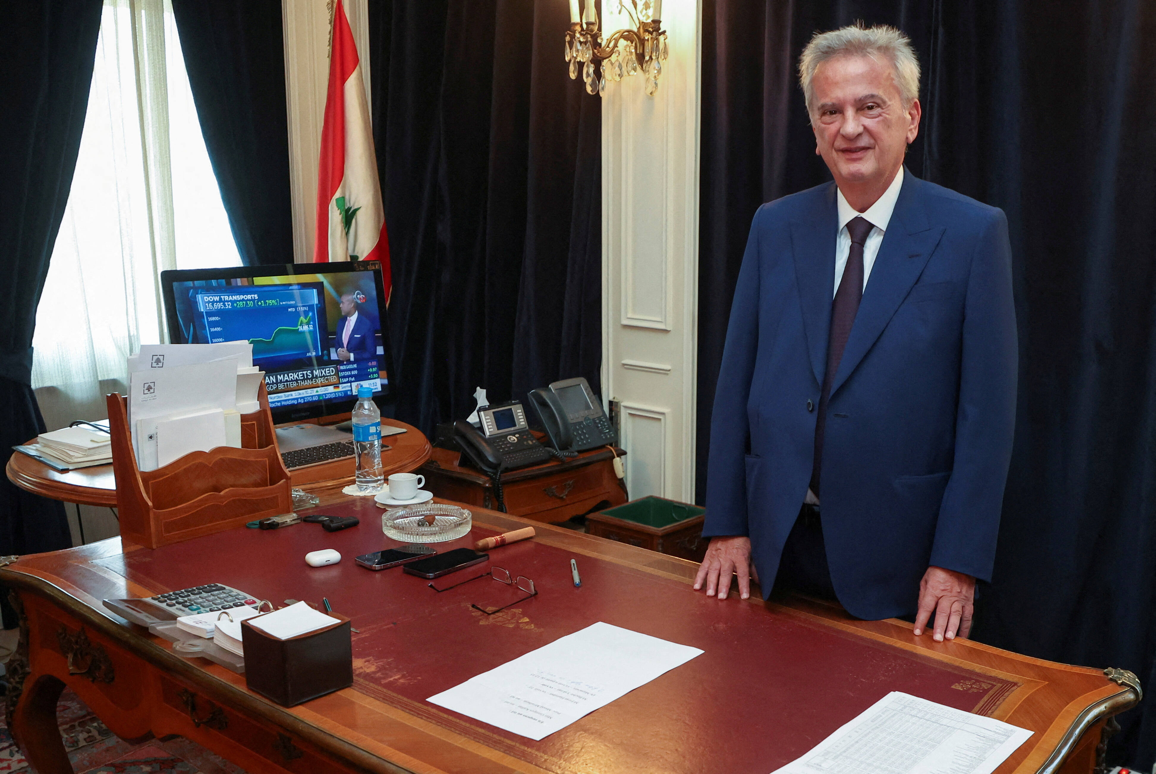 Longtime chief of Lebanon's Central Bank Riad Salameh, poses as he leaves office after a 30-year tenure, at Lebanon's Central Bank building in Beirut. Reuters