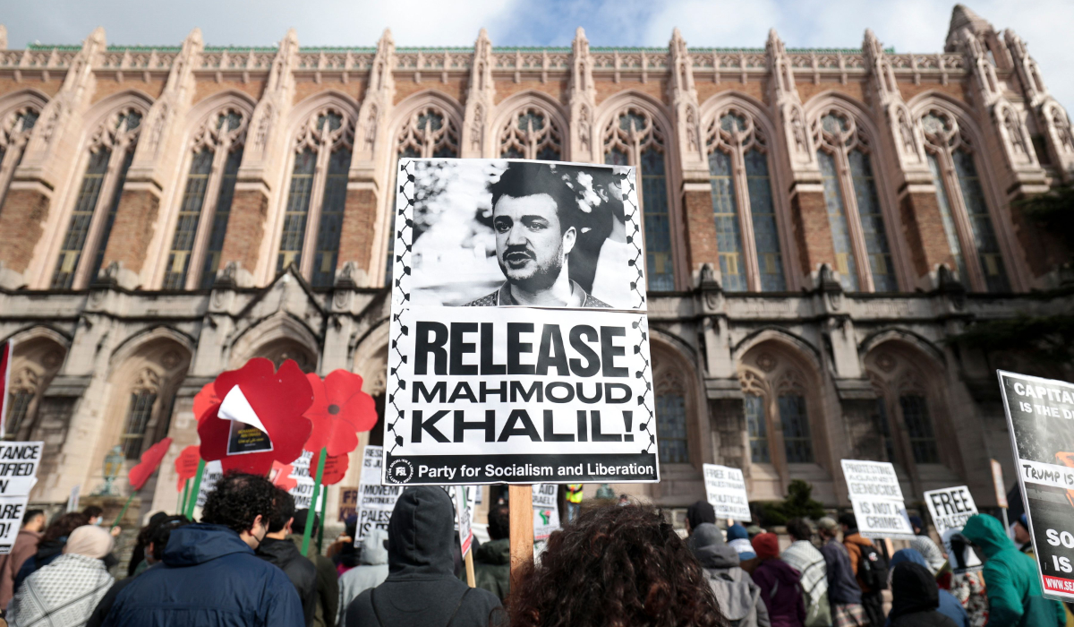 People hold signs as they protest the arrest of former Columbia University student activist Mahmoud Khalil and show support for Palestinians during a "Fight for Our Rights" demonstration by Shut It Down for Palestine (SID4P) and various local groups at the University of Washington campus in Seattle, Washington, on March 15, 2025. (AFP)