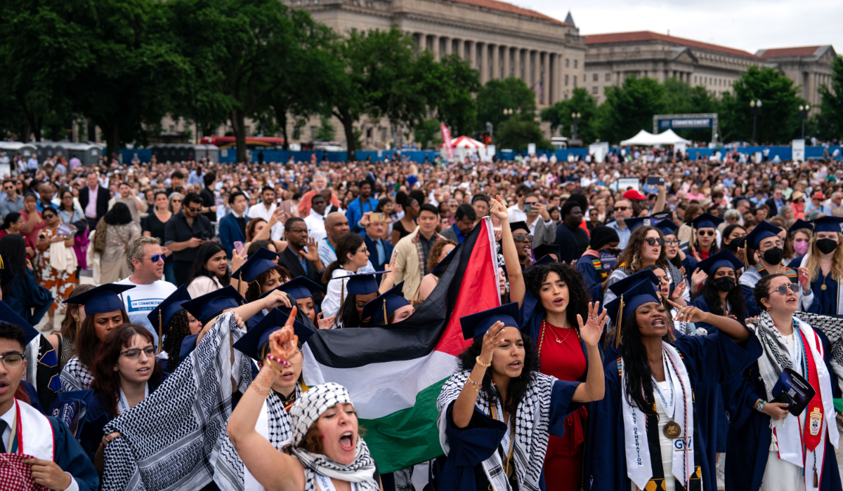 Students protest as they walk out from the George Washington University (GWU) commencement ceremony as GWU President Ellen Granberg speaks on the National Mall on May 19, 2024 in Washington, DC. (AFP)