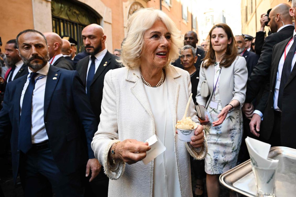 Britain’s Queen Camilla stops for an ice cream outside the Italian Parliament in Rome as part of a State visit in Italy, Apr. 9, 2025. (AFP)