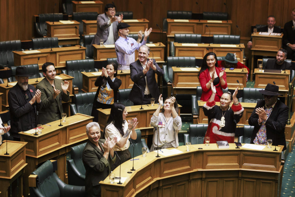 Members of Parliament celebrate as the Principles of the Treaty of Waitangi bill was rejected by Parliament in a 112 to 11 vote in Wellington, New Zealand, Thursday, April 10, 2025. (AP)