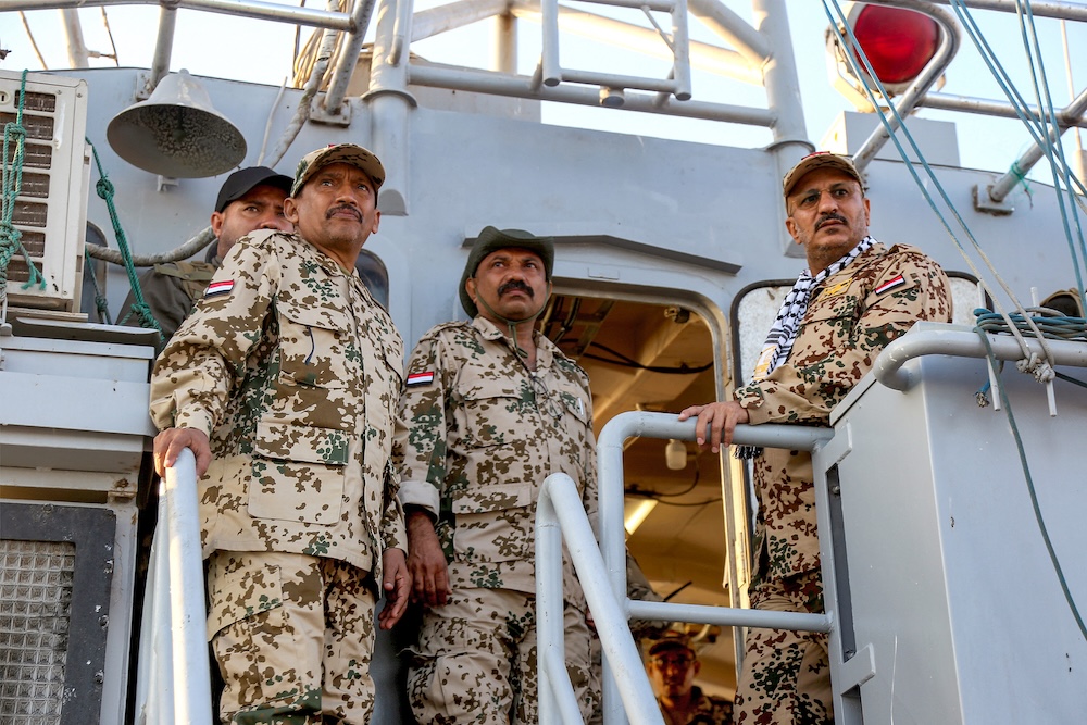 Brig. Gen. Tariq Mohammed Abdullah Saleh, right, a member of Yemen’s Presidential Leadership Council, observes as coastguard members patrol in the Red Sea off Mokha in the western Taiz province on Dec. 12, 2023. (AFP)