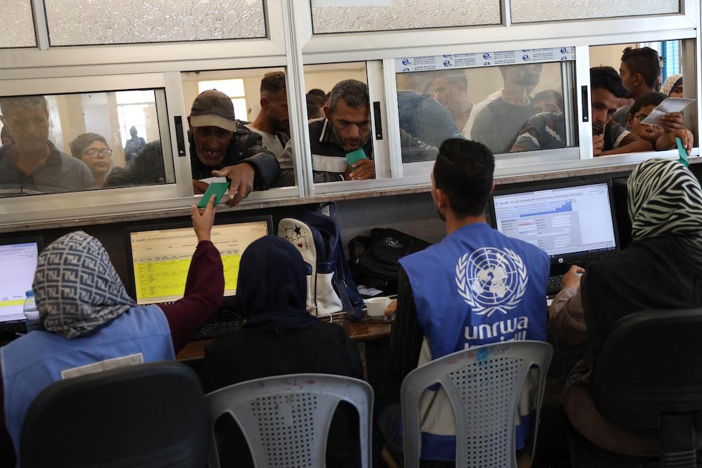 Palestinians queue to receive medicine at the UNRWA Japanese Health Center in Khan Yunis on the southern Gaza Strip on Oct. 29, 2024. (AFP file photo)