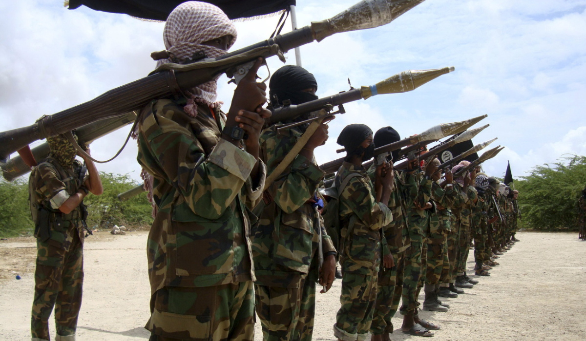 Al Shabaab militants parade new recruits after arriving in Mogadishufrom their training camp south of the capital in this October 21, 2010 file photo. (REUTERS)